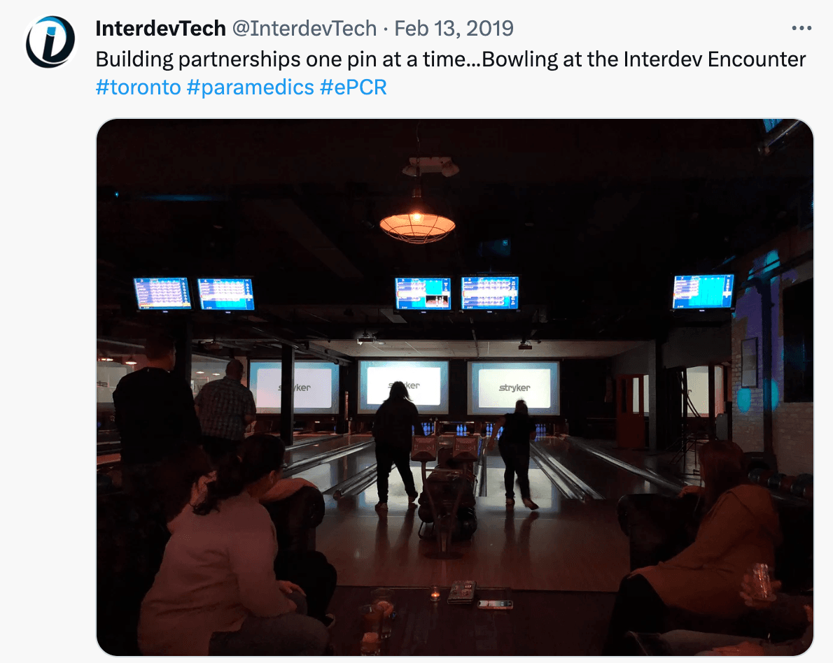 A tweet by @InterdevTech, it includes an image of people bowling.